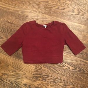 Cropped 3/4 sleeve shirt with slit in back